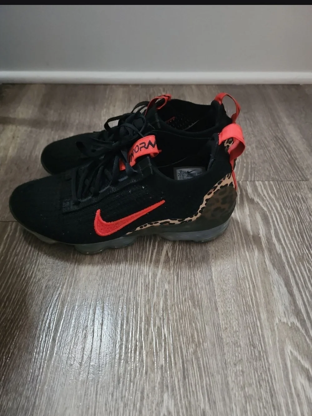 Nike Kids Black Sneakers with Red Accents